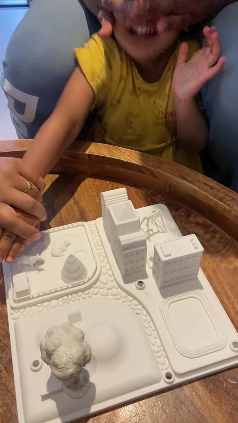 Child reacting with joy to the object