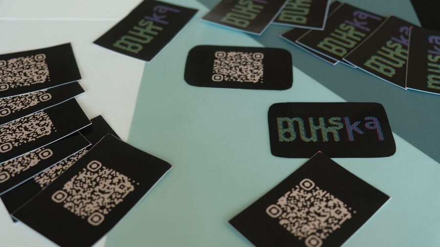 muskabun stickers spread across a teal surface